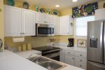 Chefs kitchen has all new stainless appliances